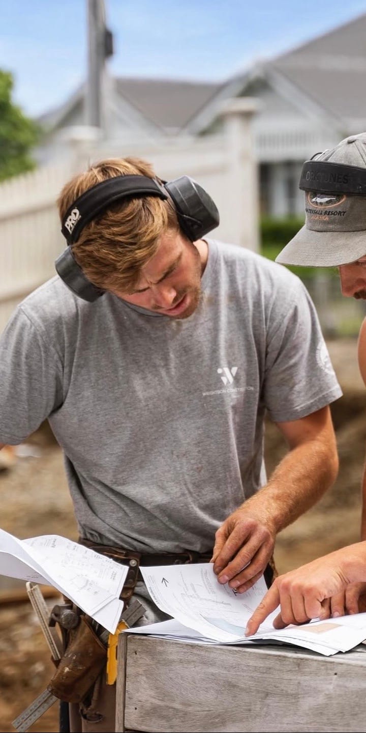 Will Wrightson and team member reviewing plans on site